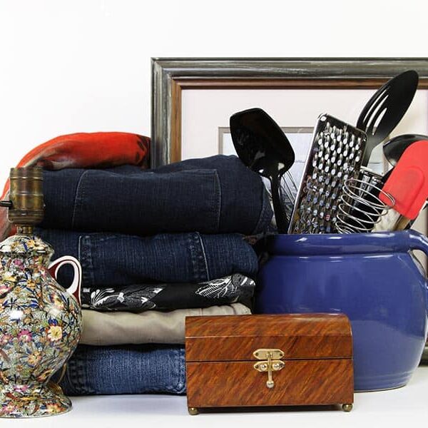 Stack of jeans and household items